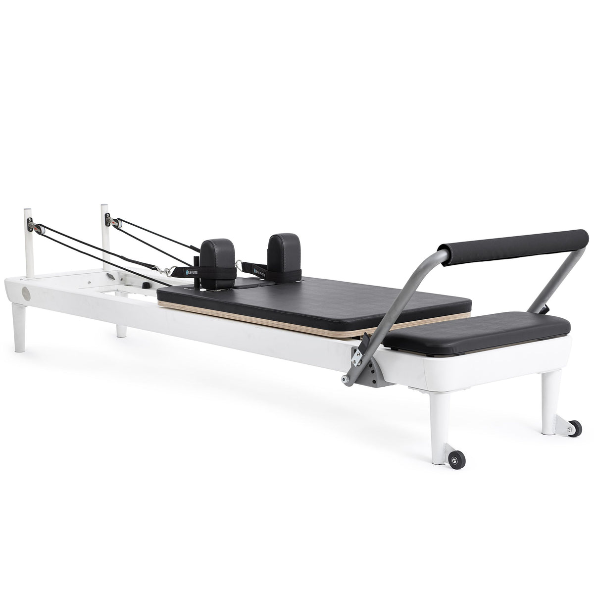 Elina Pilates Nubium Reformer Bundle with a white aluminium frame and black upholstery, angled view