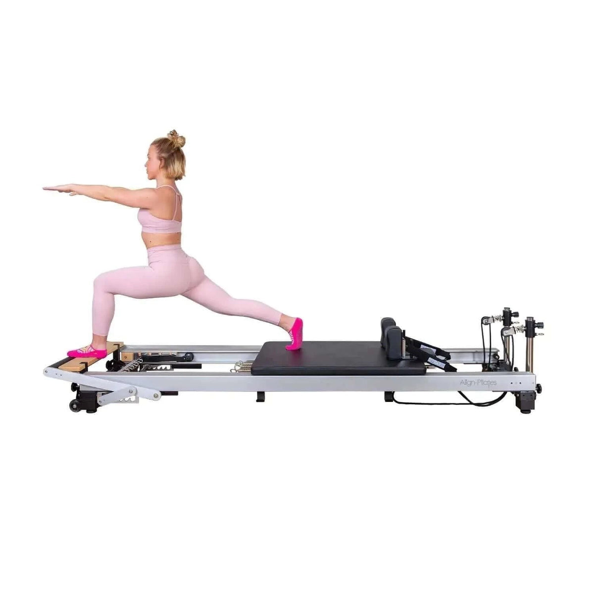 Align Pilates A8-Pro Legs, reformer on short legs with a woman in a lunge