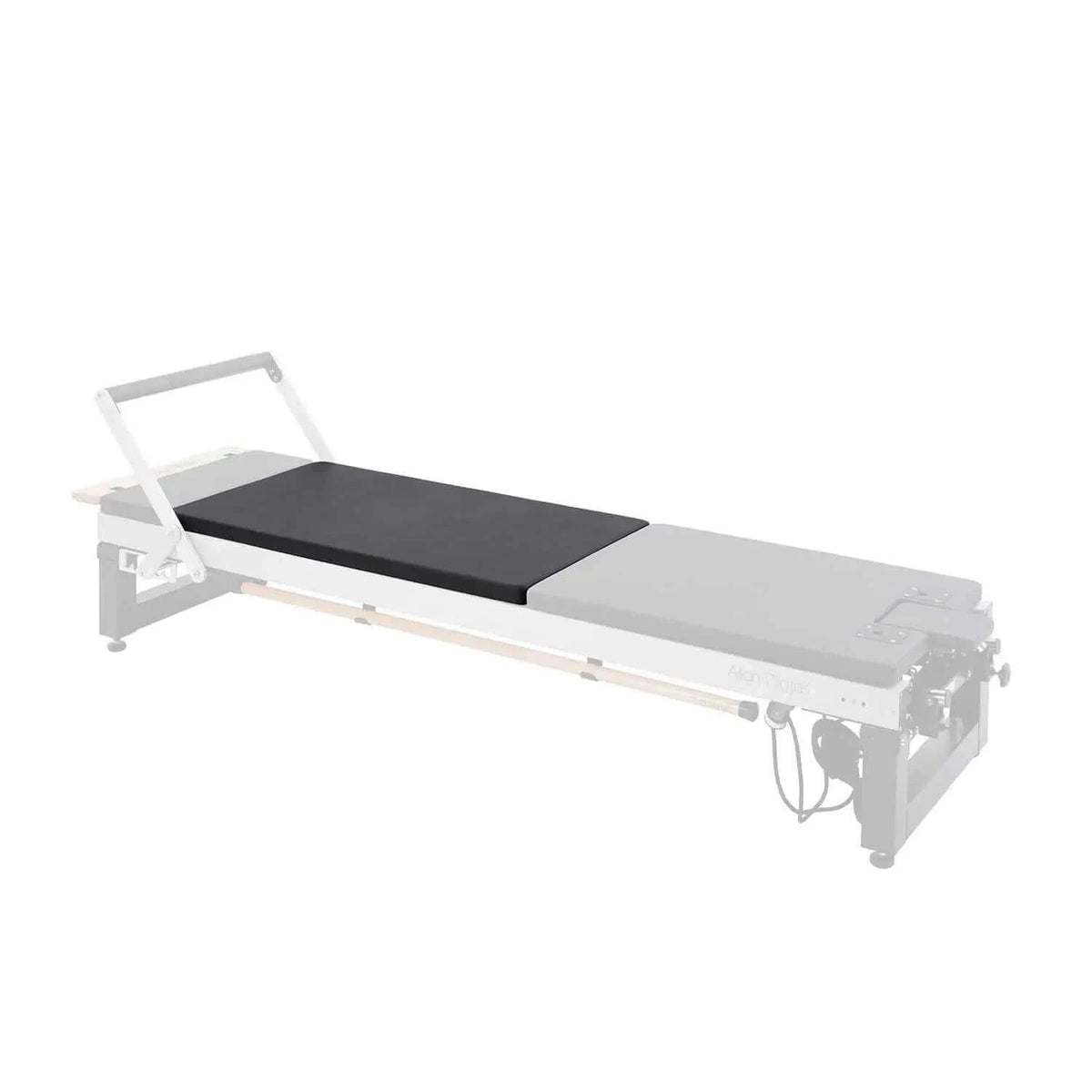 Align Pilates Mat Converter for A Series, converter highlighted on a faded reformer