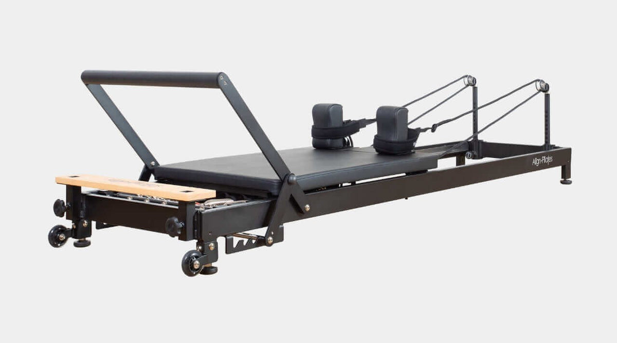 Align Pilates R8-Pro Reformer, black frame viewed from the footbar end