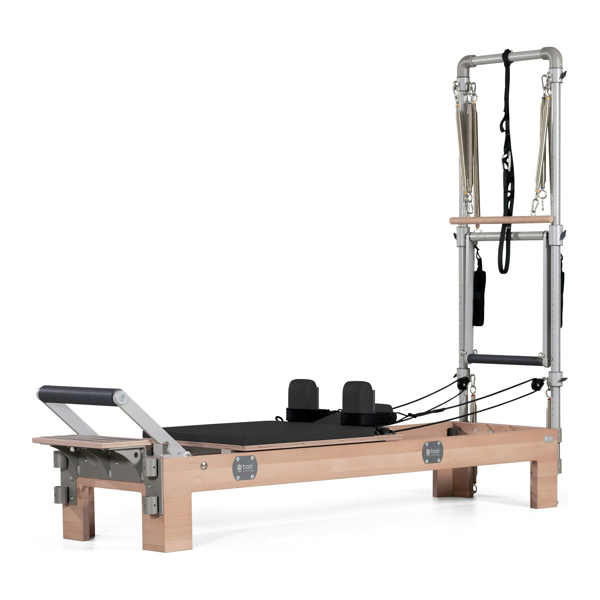 BASI Systems Compact Reformer with Tower upholstered in Moonless Night Black, the whole apparatus shown against a plain background