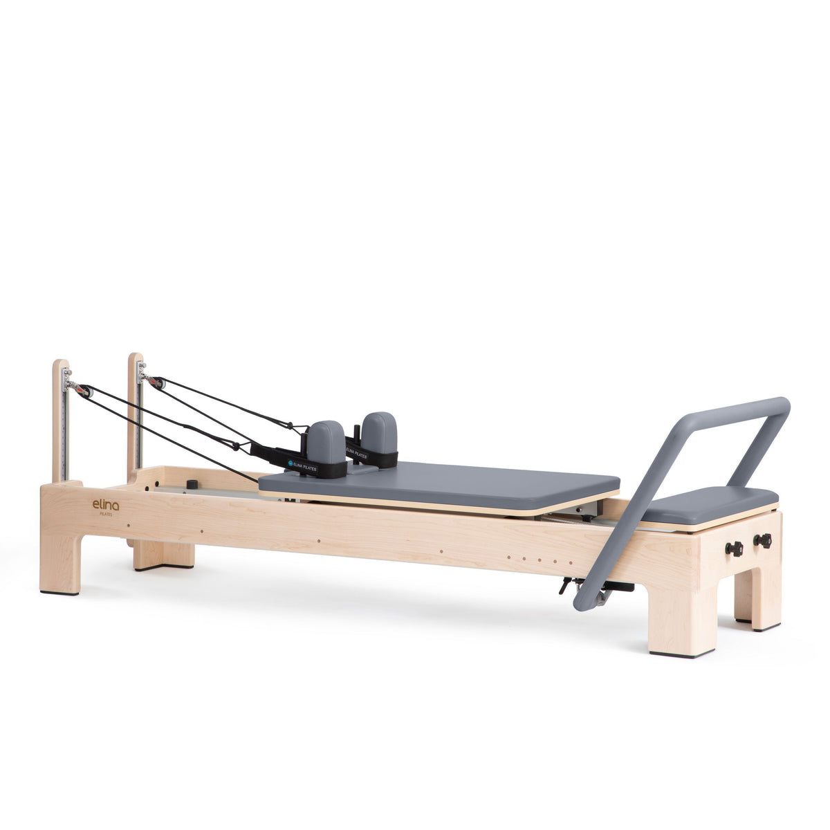 Elina Pilates Elite Advanced Reformer in grey, angled studio view with rope risers