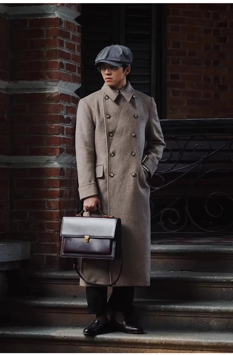 Hartley polo coat in camel worn with a briefcase
