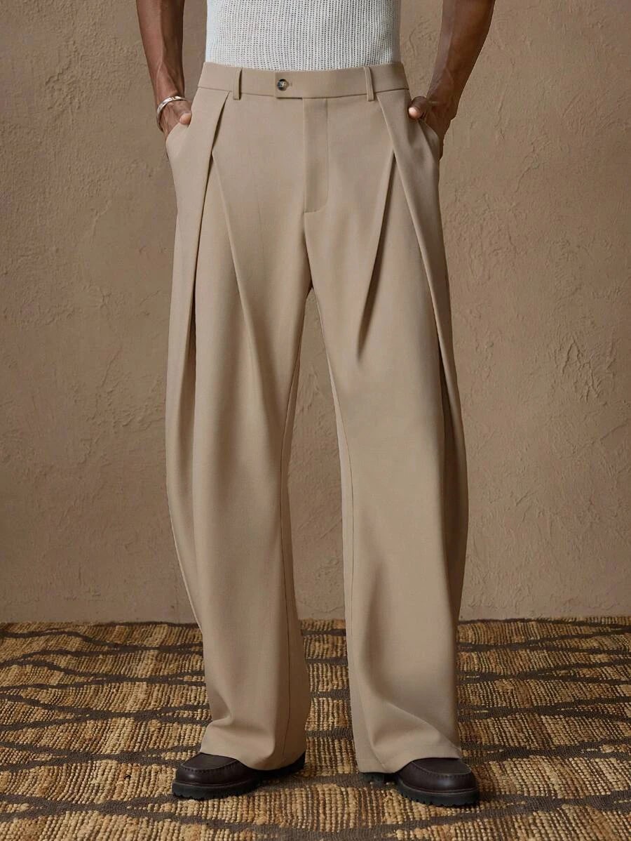 Man wearing the Napoli pleated trousers in stone