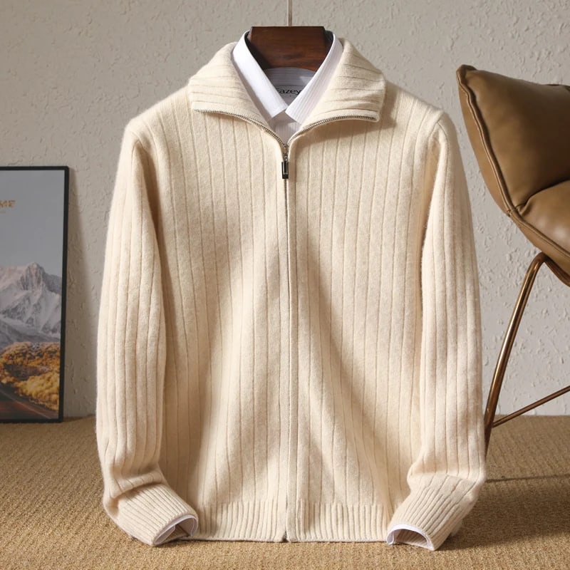 Sutton merino full-zip cardigan in cream on a hanger over a white shirt