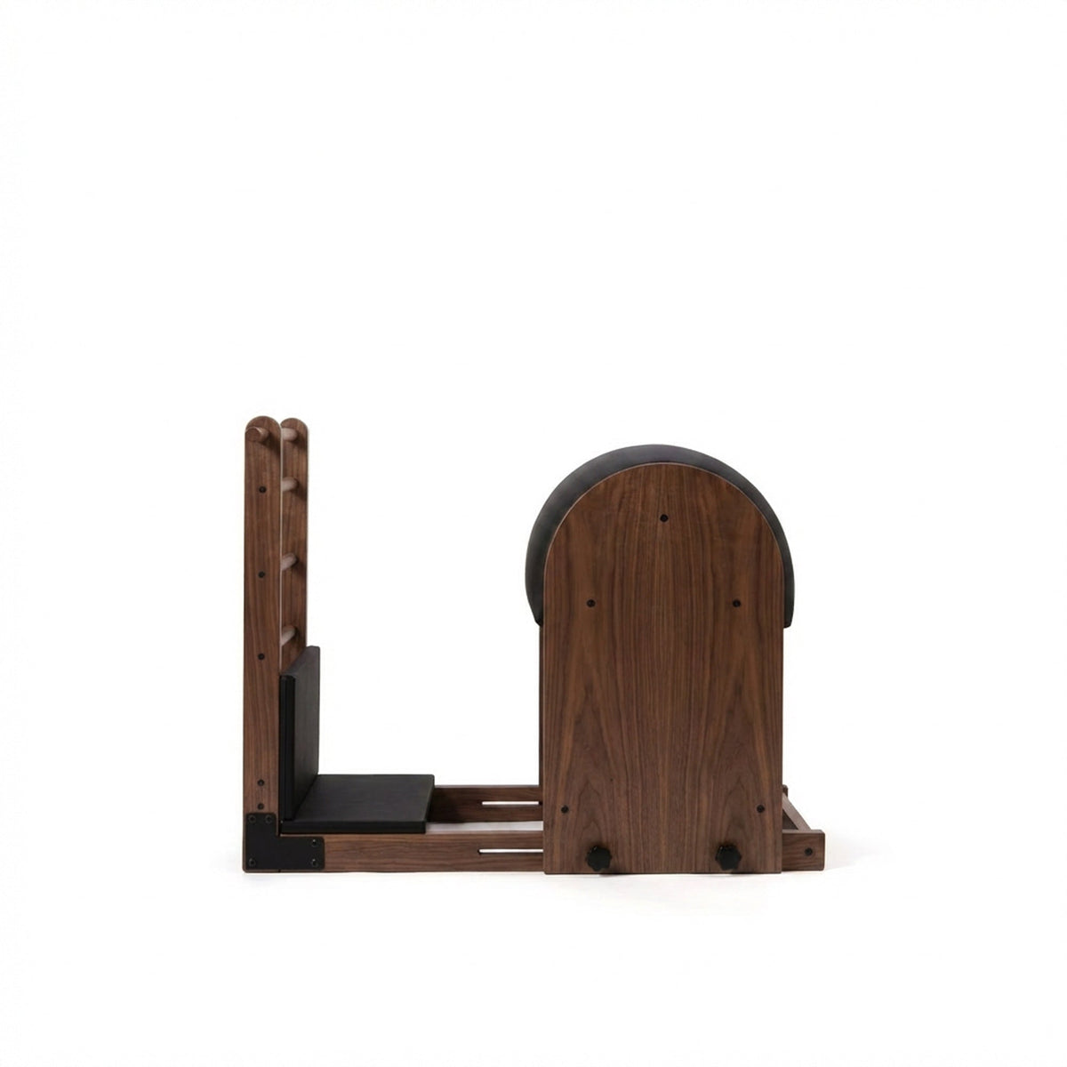 Peak Pilates Artistry High Ladder Barrel in walnut, studio view