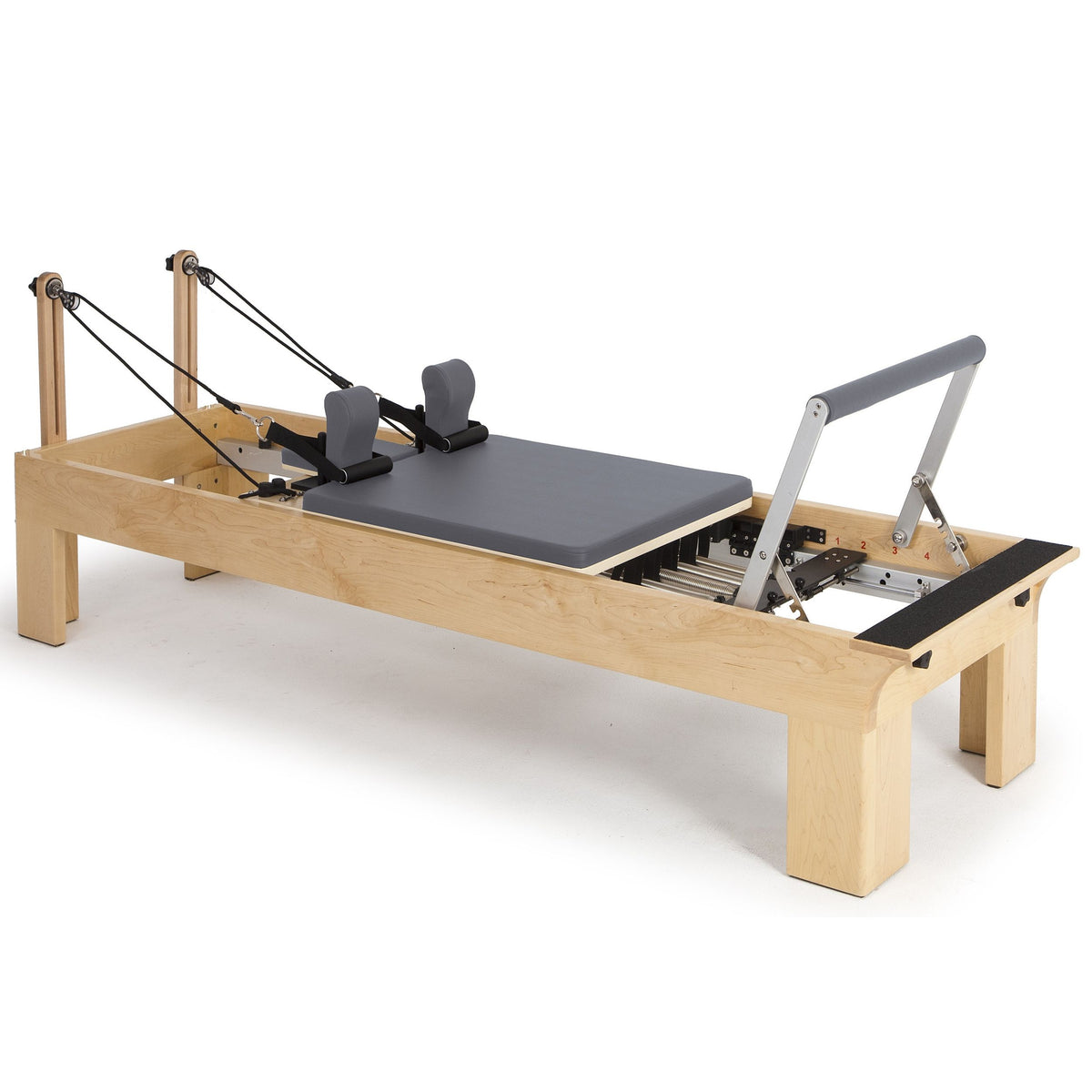 Elina Pilates Physio Wood Reformer Bundle in grey, elevated bed, studio view