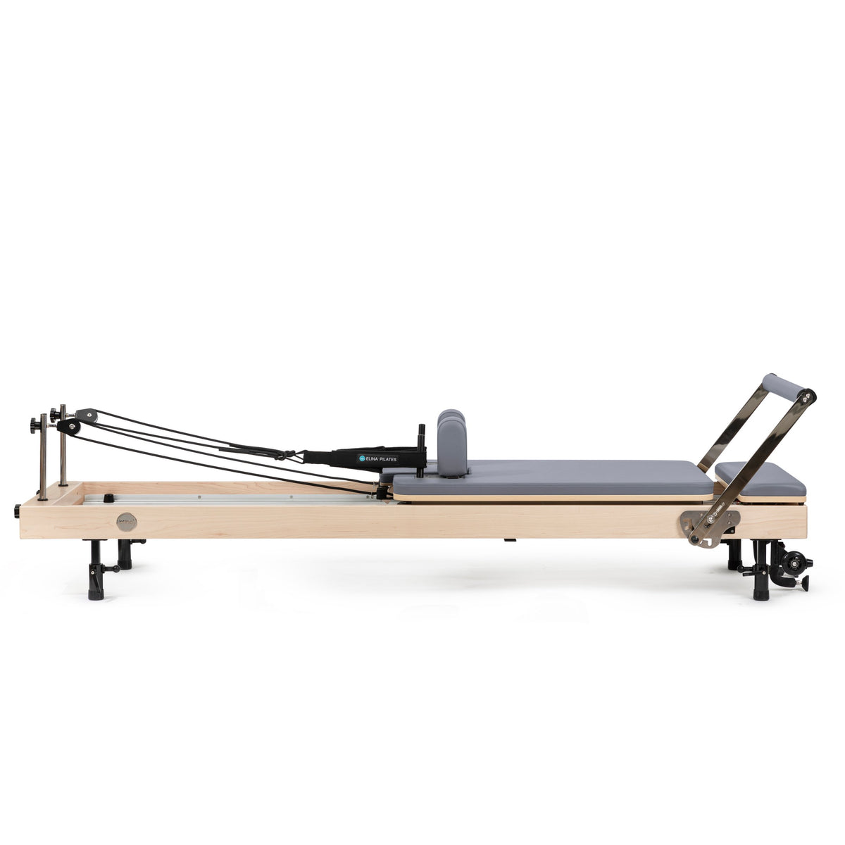 Vertical Reformer set up flat, grey upholstery, side view