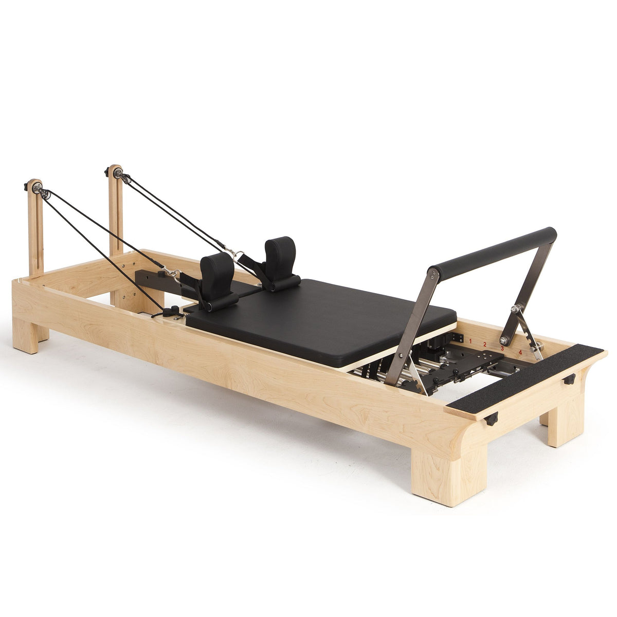 Elina Pilates Wood Reformer Bundle, a rock maple and stainless steel reformer with padded upholstery