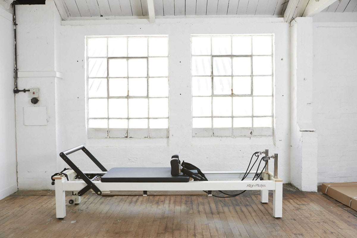 Align Pilates C8-S Pro, white reformer in a bright studio
