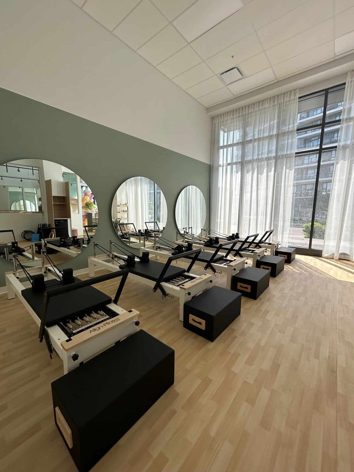 Align Pilates C8-S Pro, row of reformers in a studio