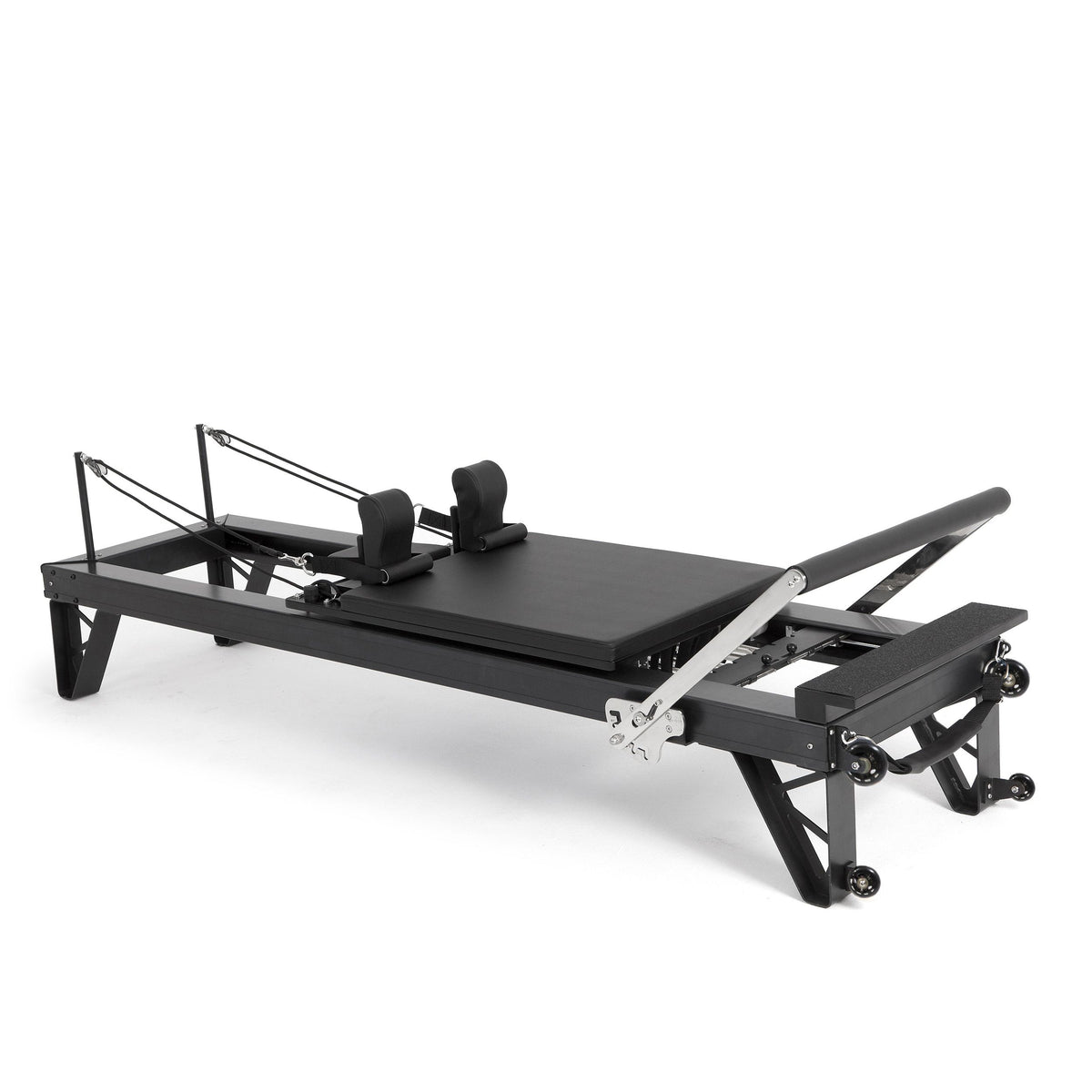 Elina Pilates HL 3 Aluminium Reformer with taller legs, black anodised frame, angled studio view