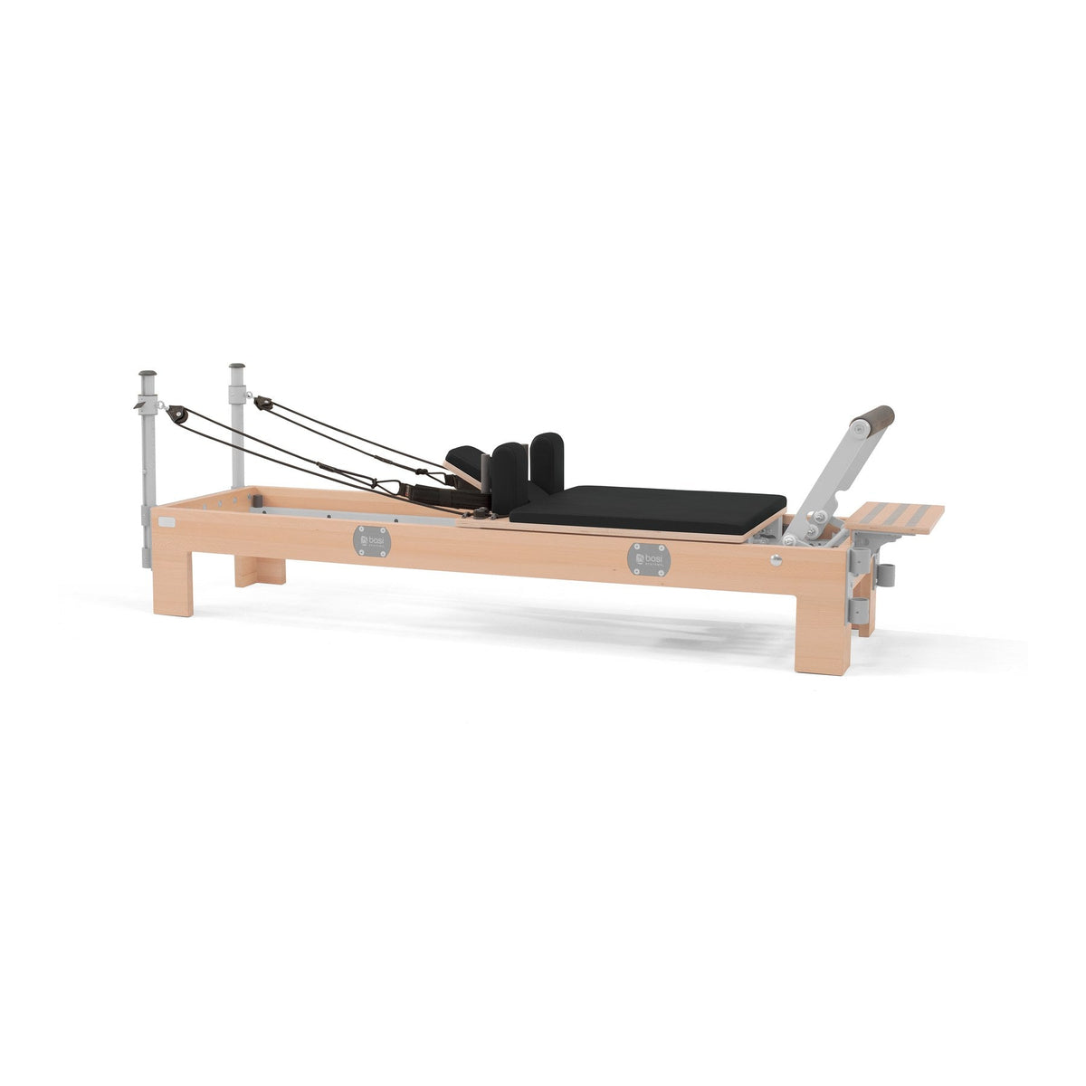 BASI Systems Compact Reformer upholstered in Moonless Night Black, the whole apparatus shown against a plain background