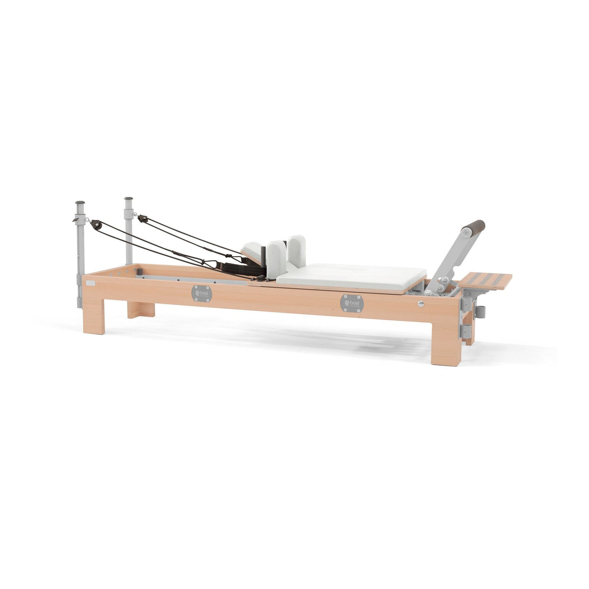BASI Systems Compact Reformer upholstered in Pristine White, the whole apparatus shown against a plain background