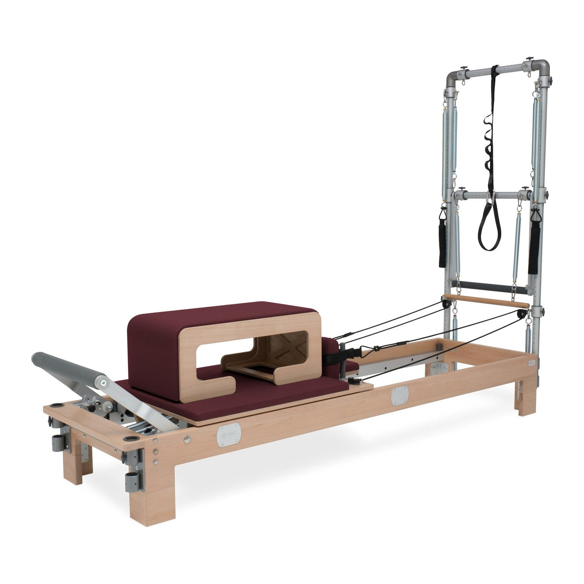 BASI Systems Reformer with Tower upholstered in Burgundy, the whole apparatus shown against a plain background, second view
