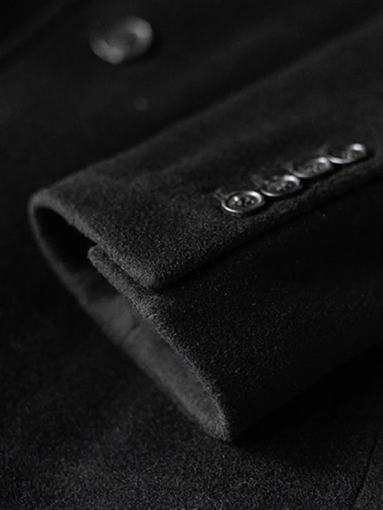 Close view of the button cuff on the Ashford overcoat