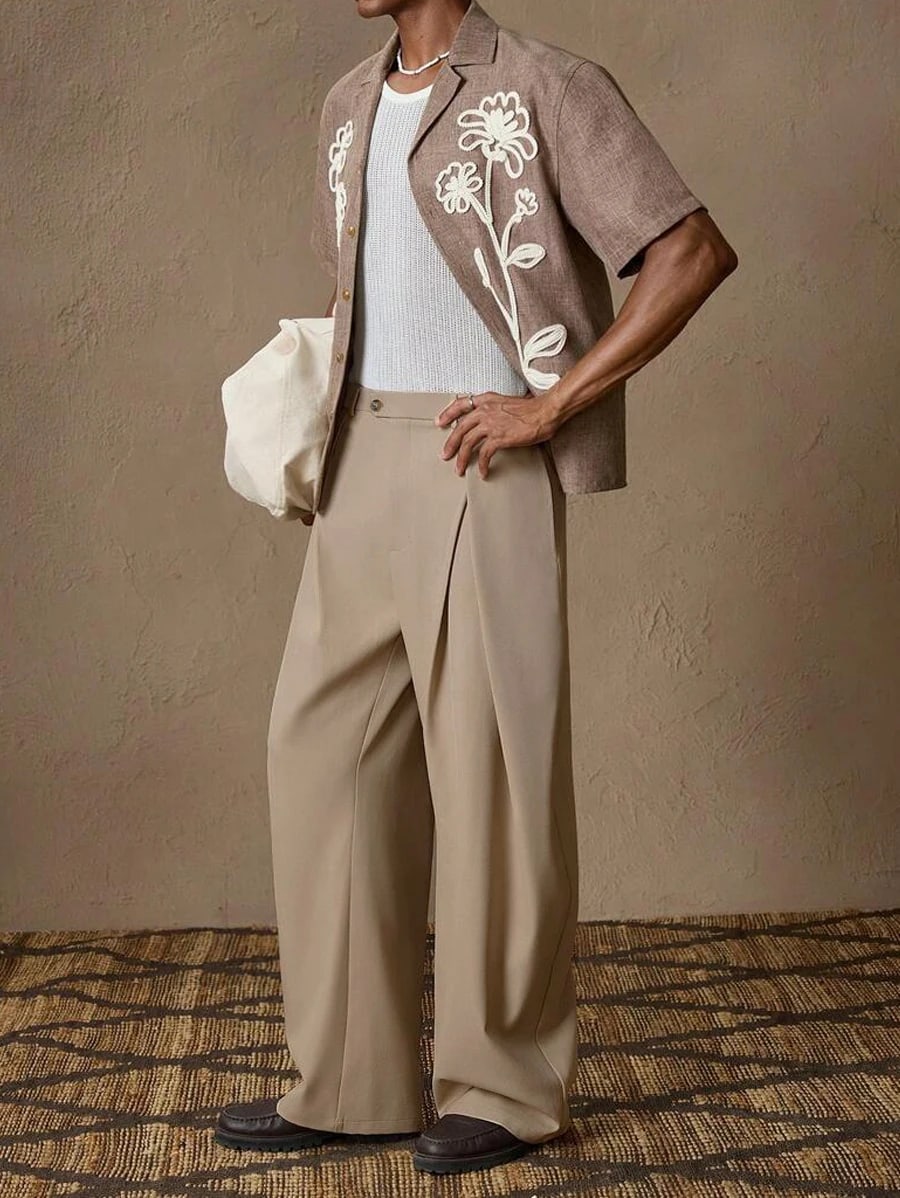 Napoli trousers in stone worn with a short-sleeve shirt