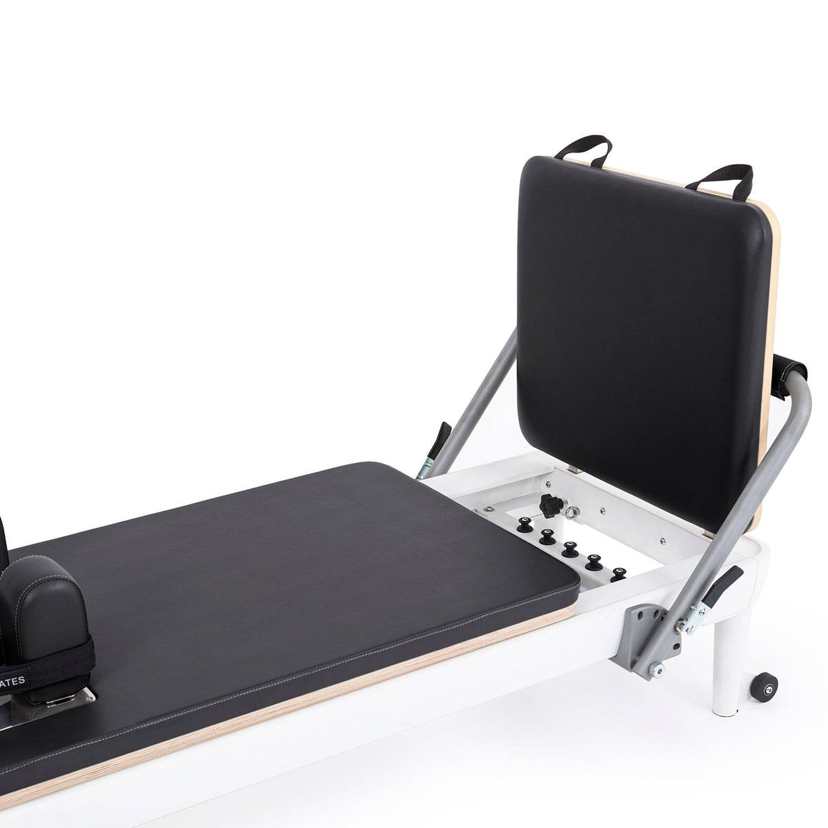Foot end with the jump board raised showing the spring bar, black