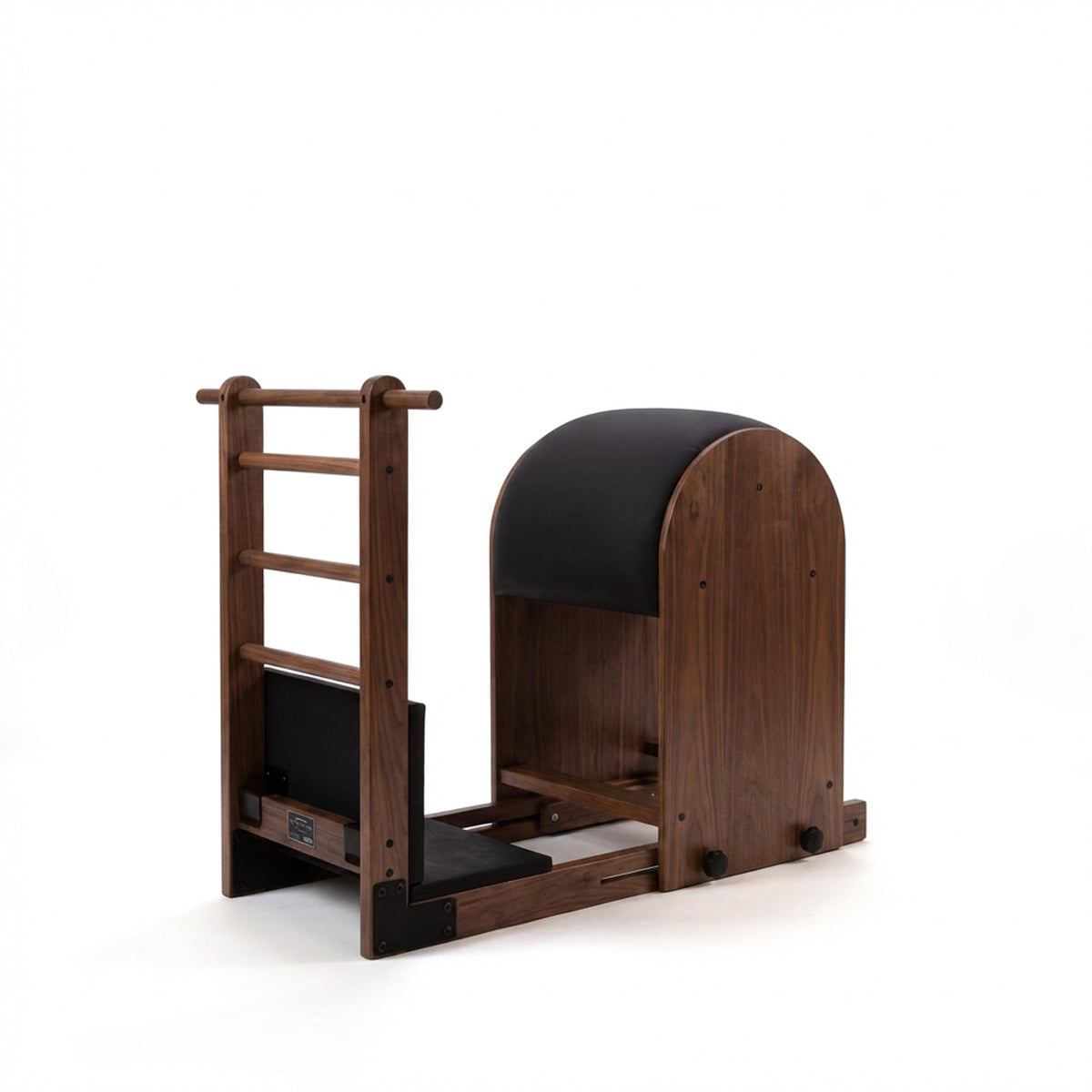 Peak Pilates Artistry High Ladder Barrel in walnut, studio view