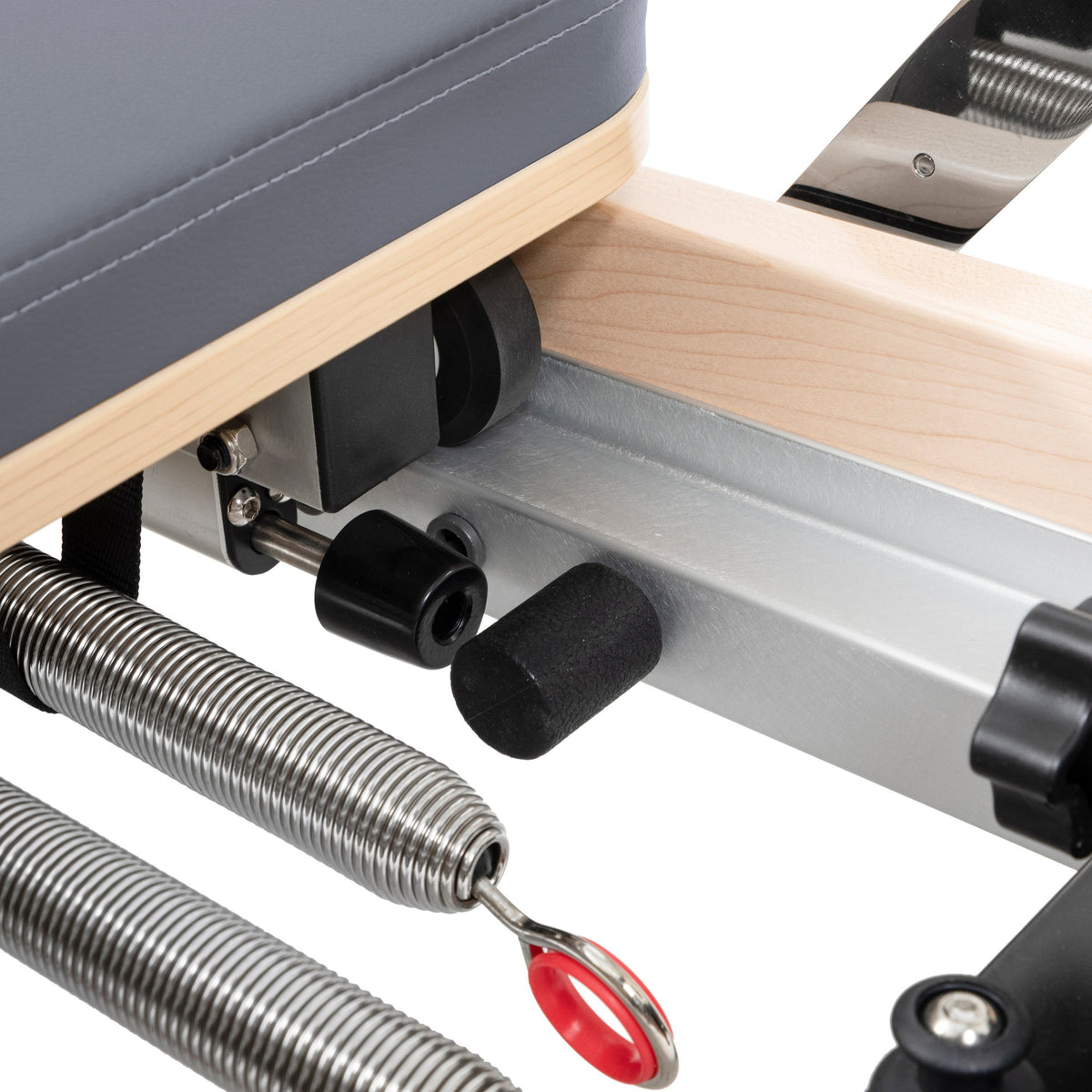 Spring eyelet and foam carriage stopper under the rail, grey