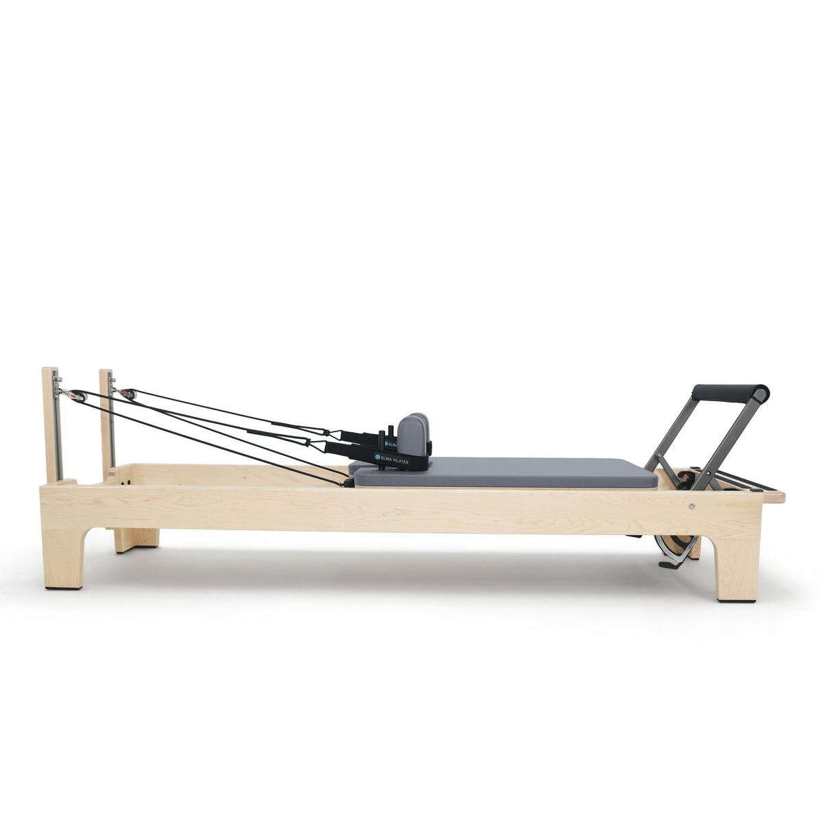 Club Reformer side view with cords stretched to the risers, grey