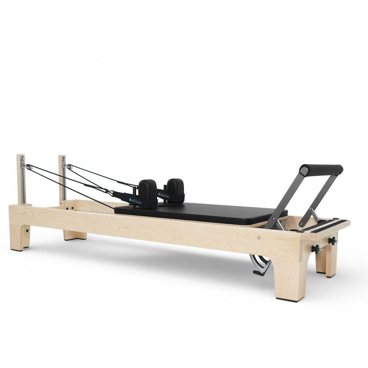 Elina Pilates Club Reformer, black upholstery, angled studio view